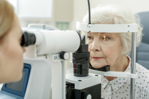 older woman getting eyes tested