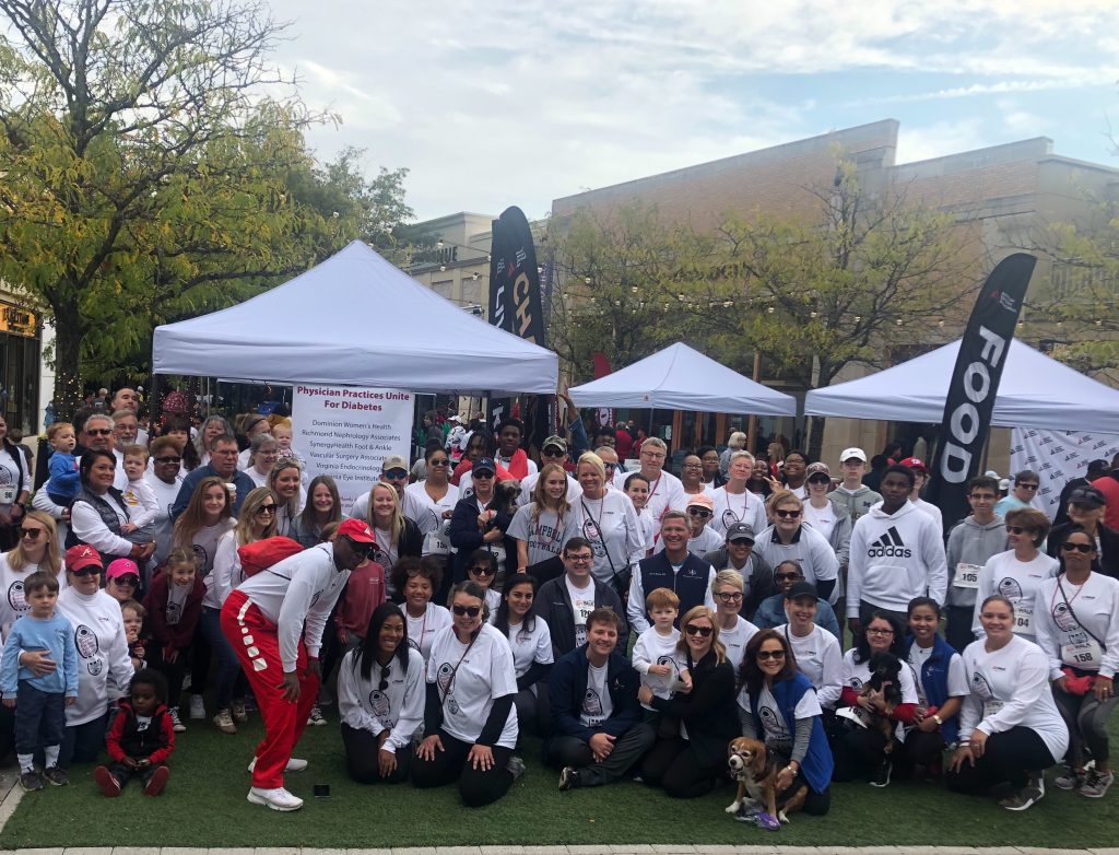 large group of participants at the STEP OUT walk event